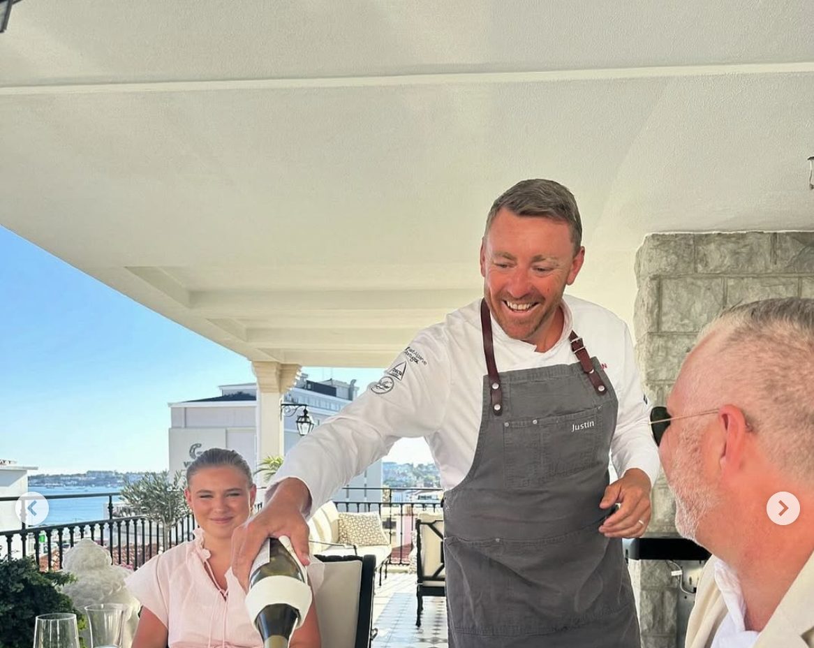 Private chef Justin Jennings serving dinner in Lisbon